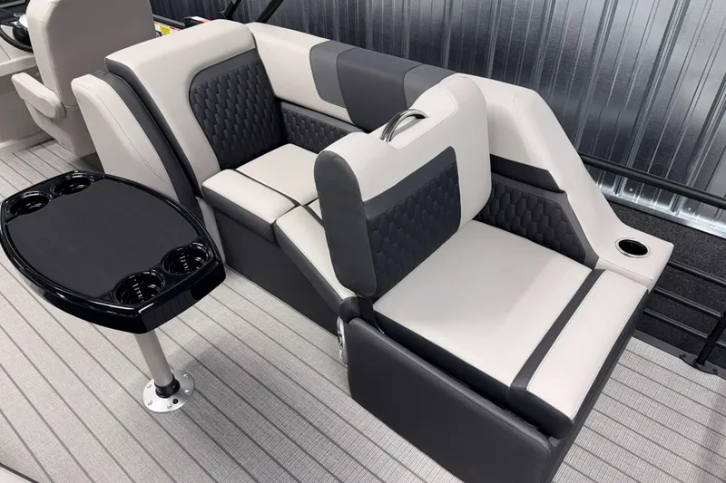 Slide: The Image of Luxurious seating in 2026 Sylvan L3 SLZ boat with modern design and cup holders. - 20