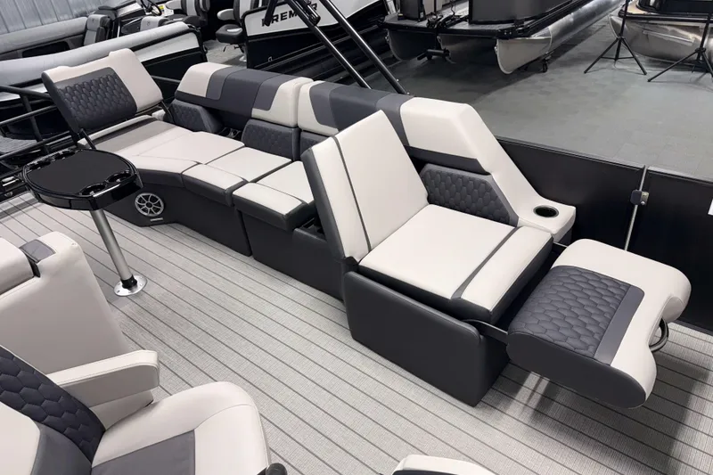 Slide: The Image of Luxurious seating on 2026 Sylvan L3 SLZ pontoon boat with modern design and comfort features. - 22