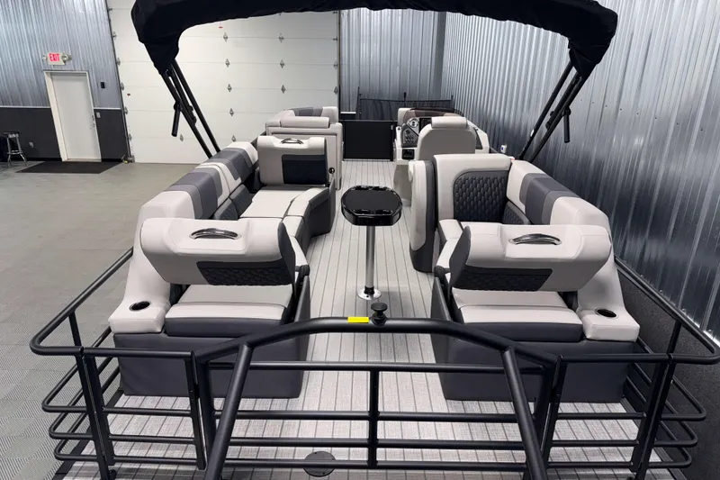 Slide: The Image of 2026 Sylvan L3 SLZ pontoon boat interior with luxurious seating and modern design. - 23