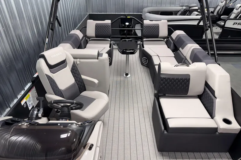 Slide: The Image of 2026 Sylvan L3 SLZ pontoon boat interior with luxurious seating and modern design. - 7