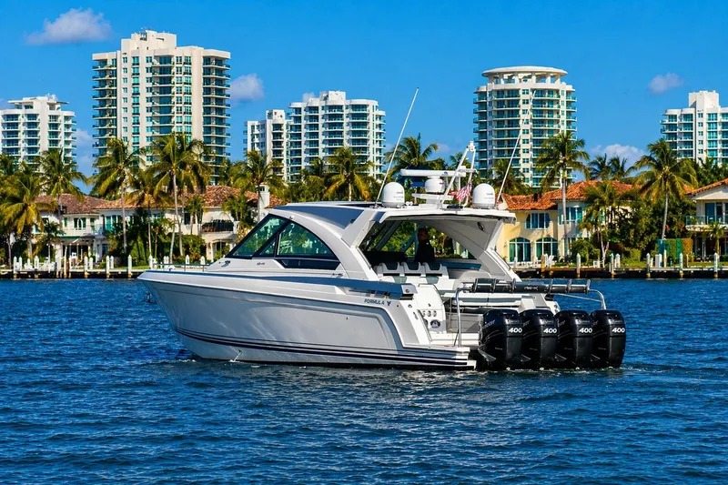 Slide: The Image of 2020 Formula 400 Super Sport Crossover yacht cruising near waterfront cityscape. - 3