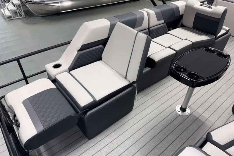 Slide: The Image of Luxurious seating on 2026 Sylvan L3 SLZ pontoon boat with sleek design and cup holders. - 20