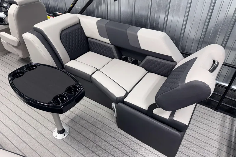Slide: The Image of Luxurious seating in 2026 Sylvan L3 SLZ boat with sleek design and integrated cup holders. - 22