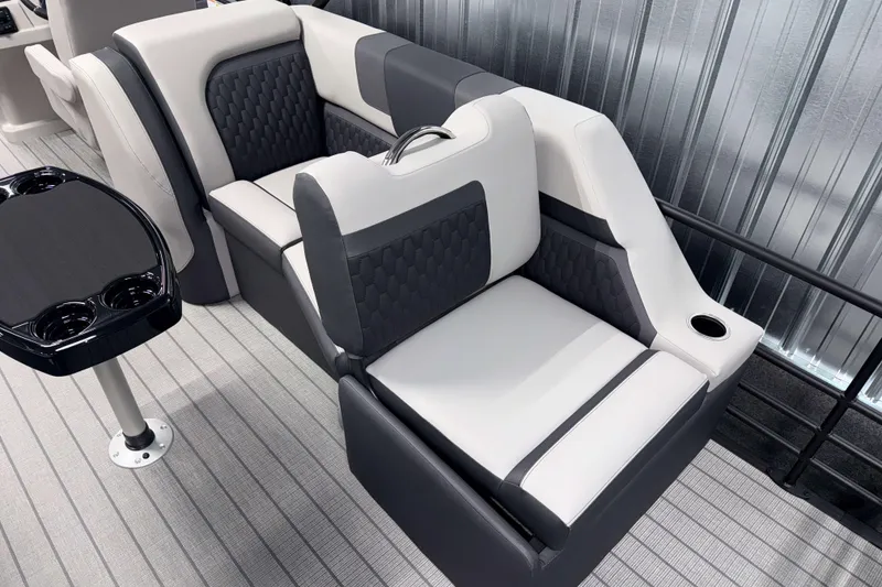 Slide: The Image of 2026 Sylvan L3 SLZ boat interior with stylish seating and cup holders. - 23