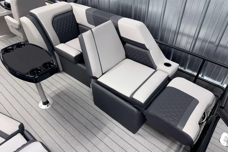 Slide: The Image of Luxurious seating in 2026 Sylvan L3 SLZ boat with sleek design and cup holders. - 24