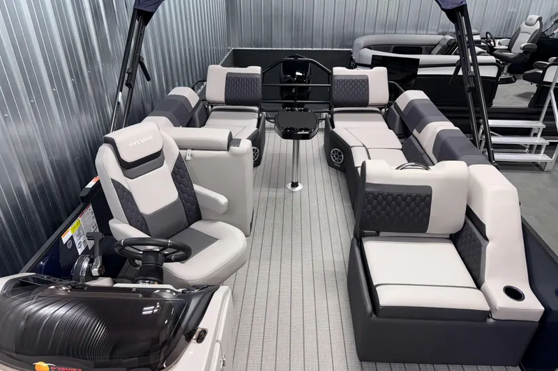 Slide: The Image of 2026 Sylvan L3 SLZ pontoon boat interior with luxurious seating and modern design. - 7