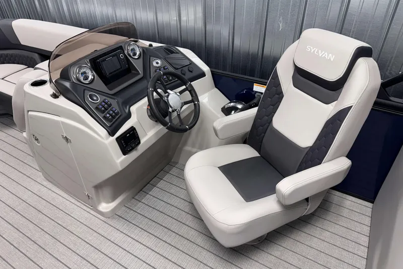 Slide: The Image of 2026 Sylvan L3 SLZ boat interior with modern helm and comfortable captain's chair. - 9