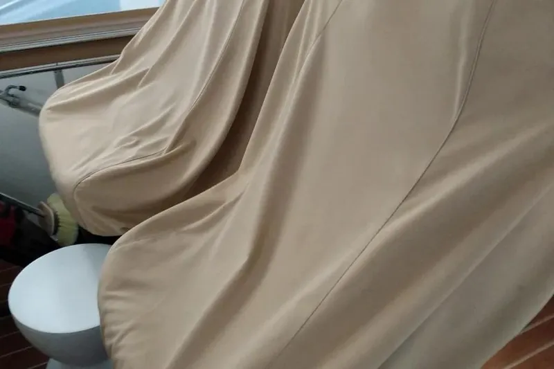 Slide: The Image of Covered seats on a 1989 Chris-Craft 381 Catalina boat interior. - 10