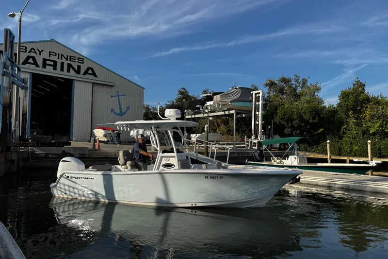 Slide: The Image of 2021 Sportsman Open 242 Center Console boat at Bay Pines Marina. - 1