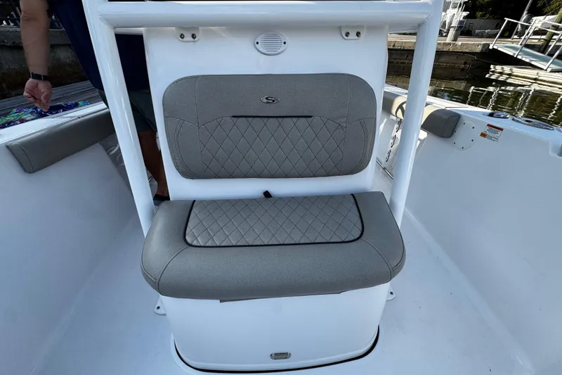 Slide: The Image of 2021 Sportsman Open 242 Center Console boat with gray cushioned seating. - 33