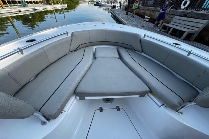 Slide: The Image of 2021 Sportsman Open 242 Center Console boat with spacious seating area. - 36
