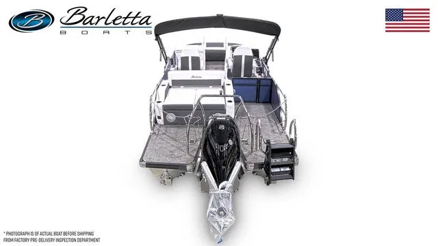 Slide: The Image of 2024 Barletta Corsa 21UC boat, rear view, showcasing deck and seating, with American flag. - 6