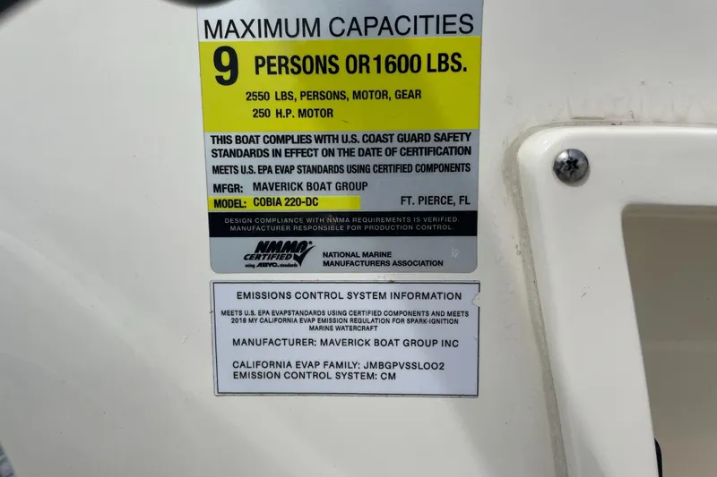 Slide: The Image of Capacity label for 2021 Cobia 220 Dual Console, 9 persons or 1600 lbs, 250 HP motor. - 7