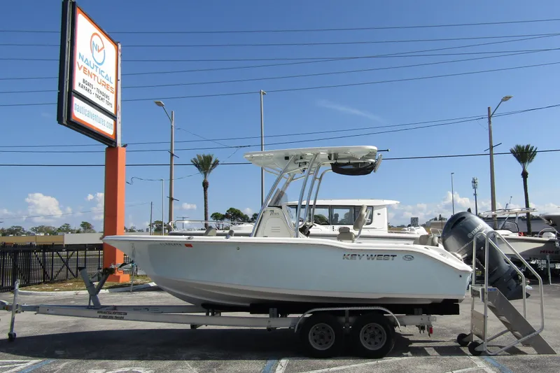 The Image of 2022 Key West 219 FS boat on trailer at Nautical Ventures dealership. - 0