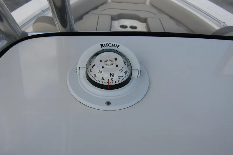 Slide: The Image of Compass on 2022 Key West 219 FS boat dashboard. - 20