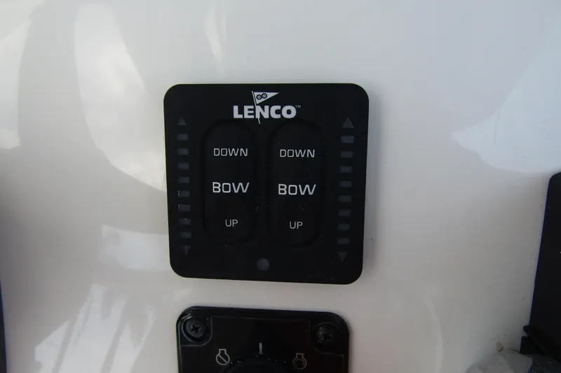 Slide: The Image of Lenco trim tab control panel on 2022 Key West 219 FS boat. - 25