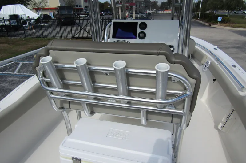 Slide: The Image of 2022 Key West 219 FS boat interior with rod holders and cooler. - 34