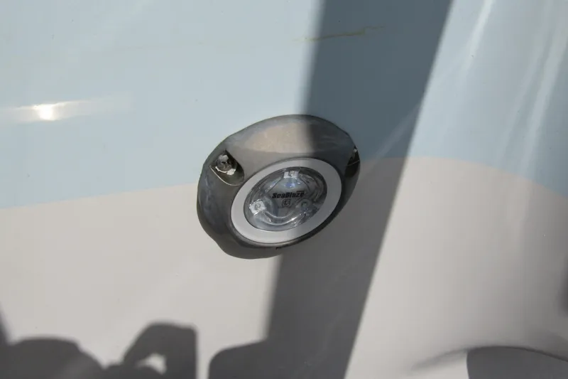 Slide: The Image of Close-up of a 2022 Key West 219 FS boat's underwater light fixture. - 6