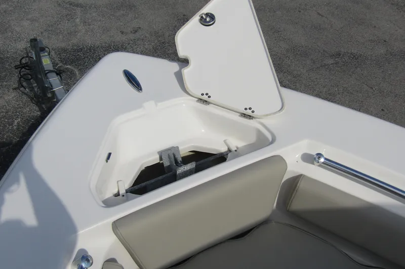 Slide: The Image of 2022 Key West 219 FS boat bow storage compartment with open hatch. - 8