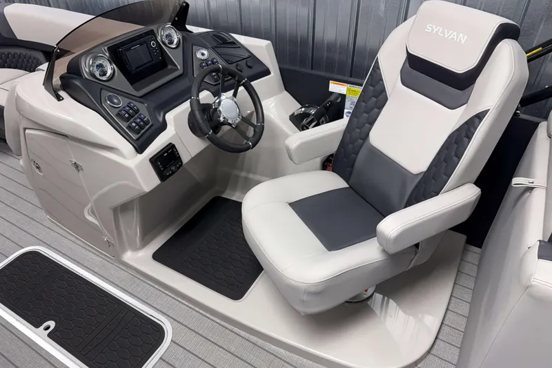 Slide: The Image of 2026 Sylvan L3 SLZ Platinum boat interior with modern steering console and captain's chair. - 10
