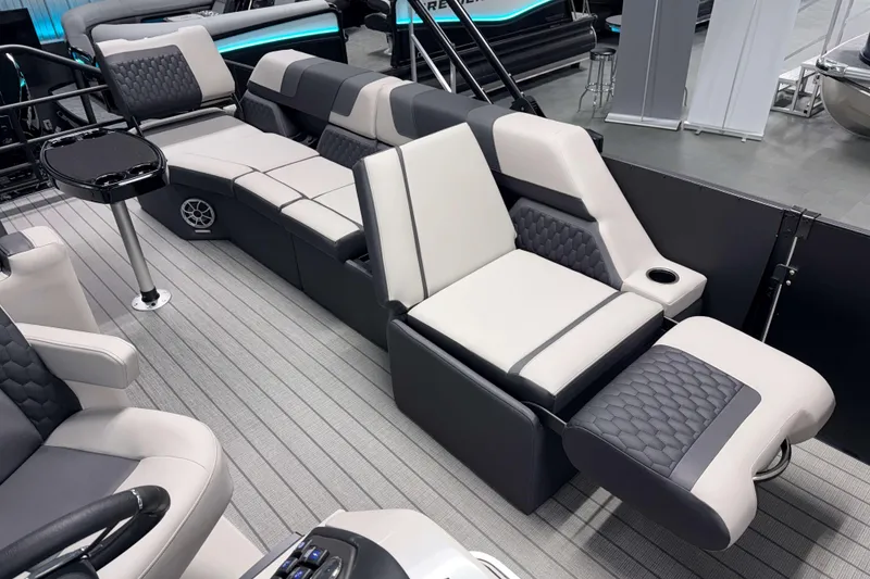 Slide: The Image of Luxurious interior of 2026 Sylvan L3 SLZ Platinum pontoon boat with plush seating and modern design. - 20