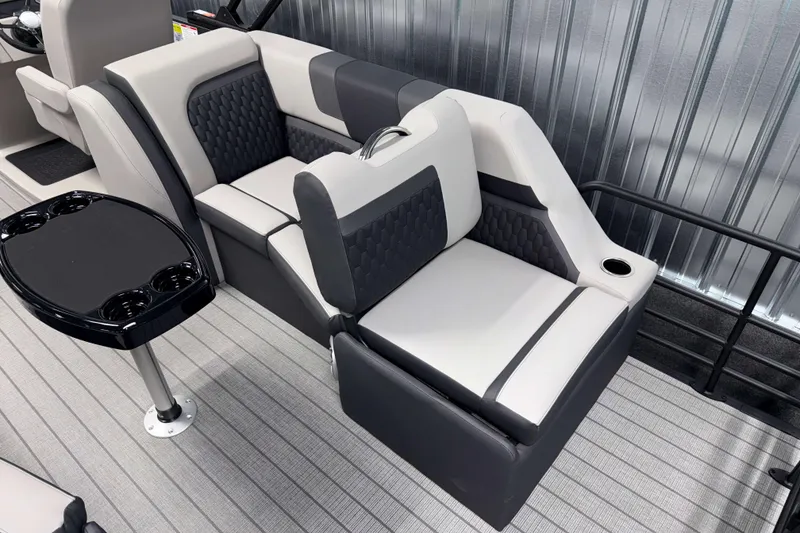 Slide: The Image of Luxurious seating on 2026 Sylvan L3 SLZ Platinum boat with sleek design and cup holders. - 26