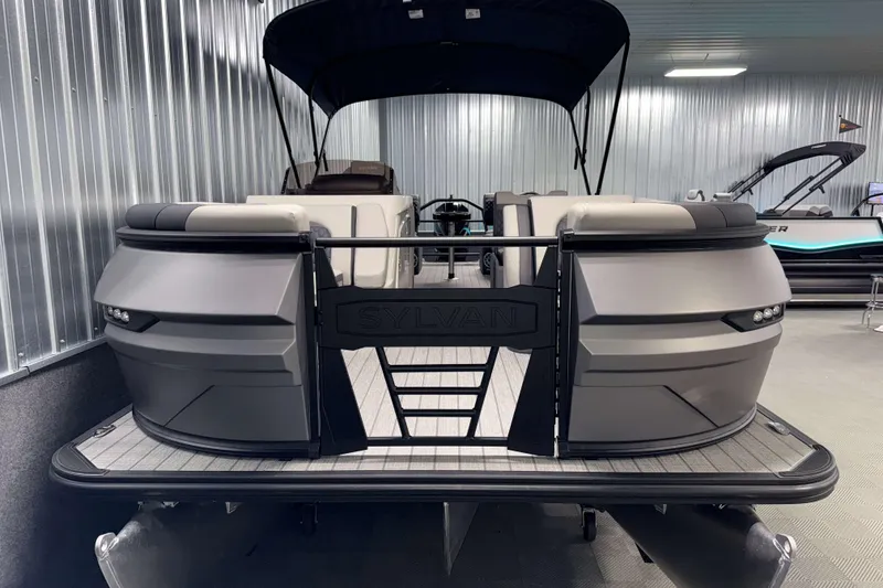 Slide: The Image of 2026 Sylvan L3 SLZ Platinum pontoon boat in showroom, sleek design, modern features. - 29