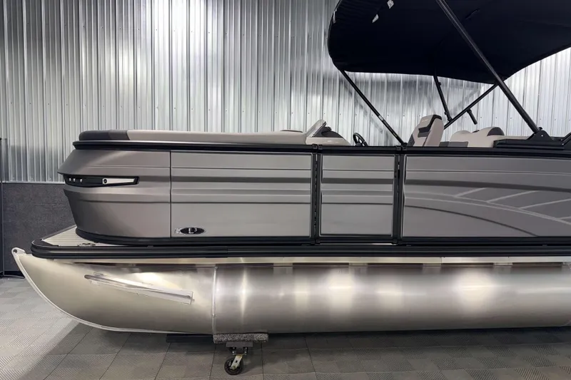 Slide: The Image of 2026 Sylvan L3 SLZ Platinum pontoon boat with sleek design and modern features. - 31