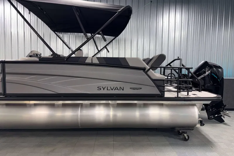 Slide: The Image of 2026 Sylvan L3 SLZ Platinum pontoon boat with canopy and Mercury outboard motor. - 33