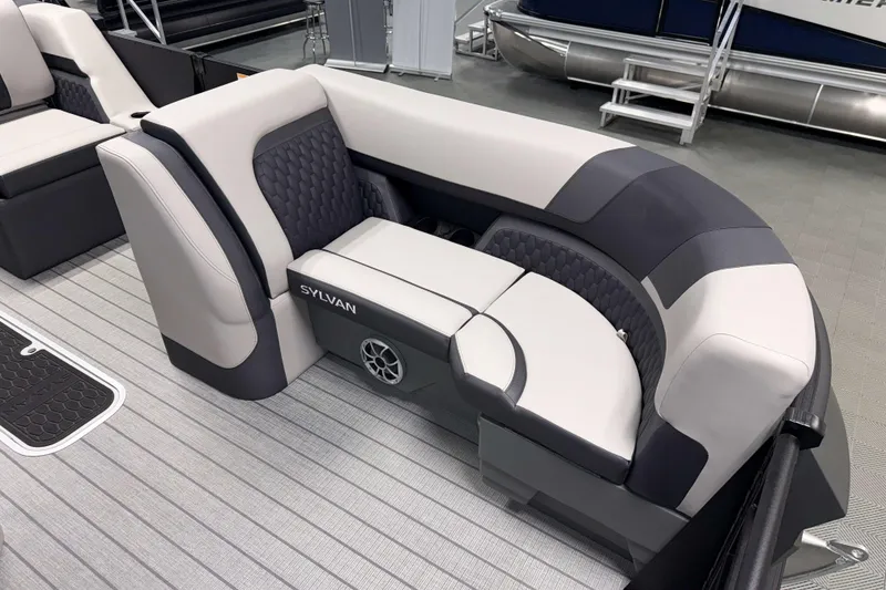 Slide: The Image of 2026 Sylvan L3 SLZ Platinum pontoon boat interior with luxurious seating and modern design. - 5