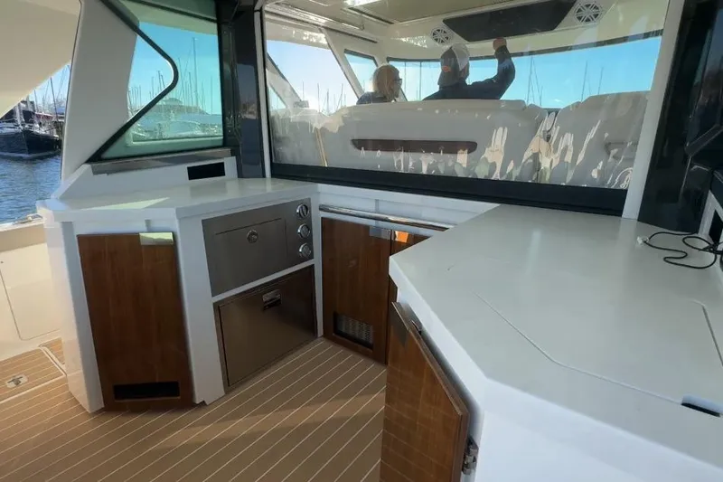 Slide: The Image of 2024 Tiara Yachts 48 LS interior with modern cabinetry and spacious design. - 21