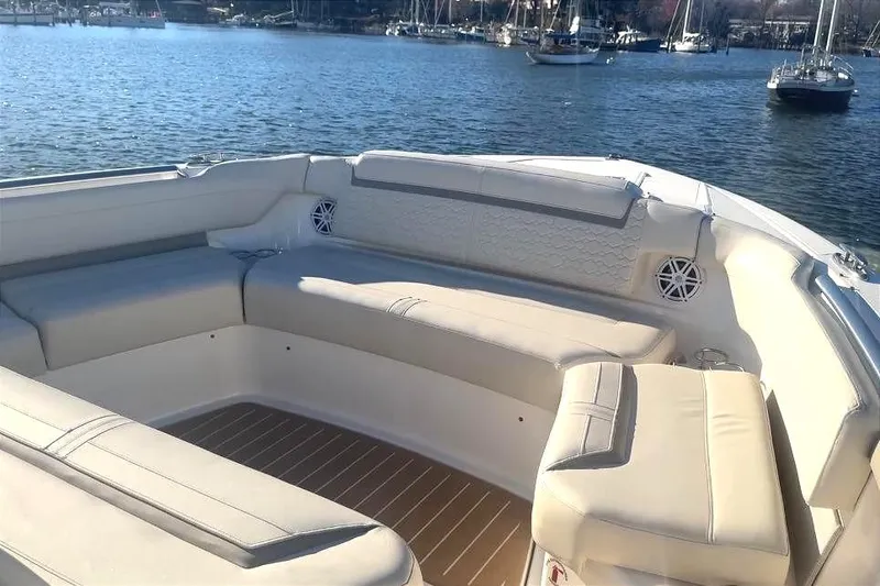 Slide: The Image of Interior of 2024 Tiara Yachts 48 LS with beige seating area. - 22