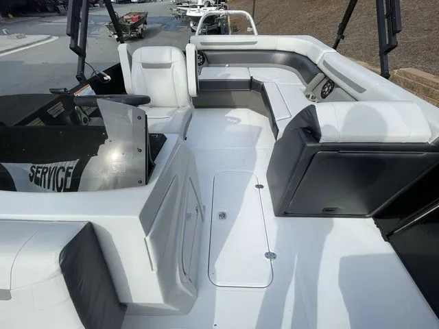 Slide: The Image of 2024 Hurricane FunDeck 1960 RE OB boat interior with spacious seating and modern design. - 10