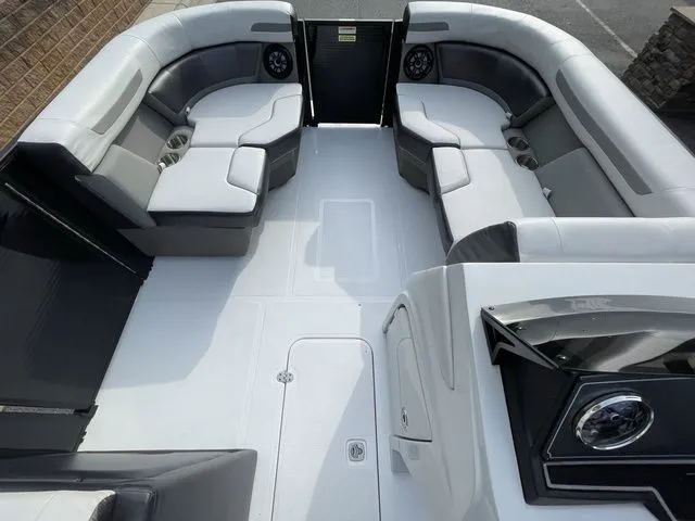 Slide: The Image of 2024 Hurricane FunDeck 1960 RE OB boat interior with spacious seating and modern design. - 7