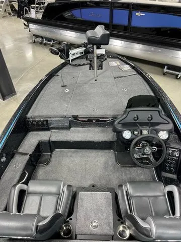 Slide: The Image of 2024 Phoenix Bass Boats 919 Elite interior with dual seats and steering console. - 4
