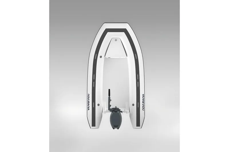 Slide: The Image of 2025 Novurania TR 270 inflatable boat with outboard motor, side view on gray background. - 7