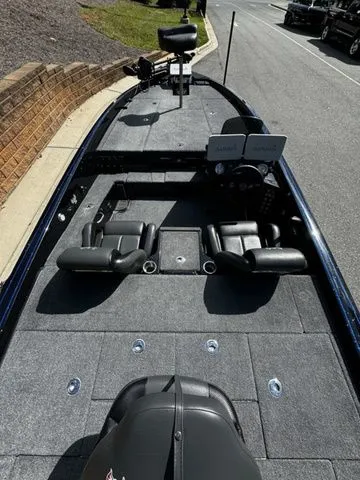 Slide: The Image of 2024 Phoenix Bass Boats 20 XE with dual seats and advanced navigation system. - 4