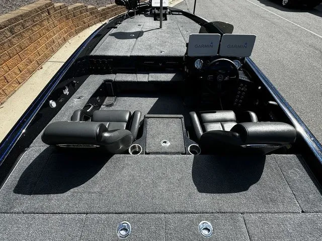 Slide: The Image of 2024 Phoenix Bass Boats 20 XE interior with dual Garmin displays and seating. - 5