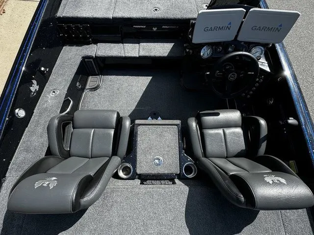 Slide: The Image of 2024 Phoenix Bass Boats 20 XE interior with dual Garmin displays and comfortable seating. - 6