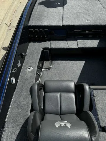 Slide: The Image of 2024 Phoenix Bass Boats 20 XE interior with sleek seating and spacious deck. - 9