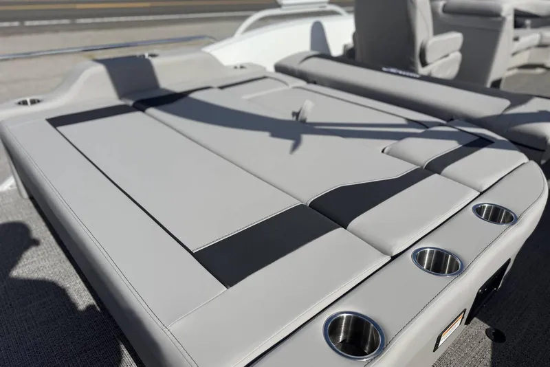 Slide: The Image of 2026 Barletta ARIA 22UC boat interior with sleek seating and built-in cup holders. - 24