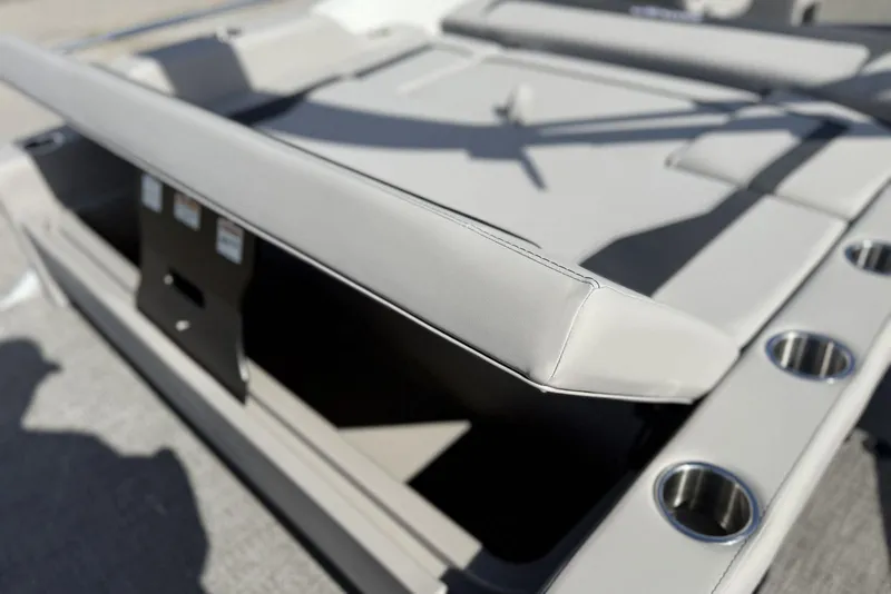 Slide: The Image of 2026 Barletta ARIA 22UC boat interior with sleek seating and cup holders. - 25