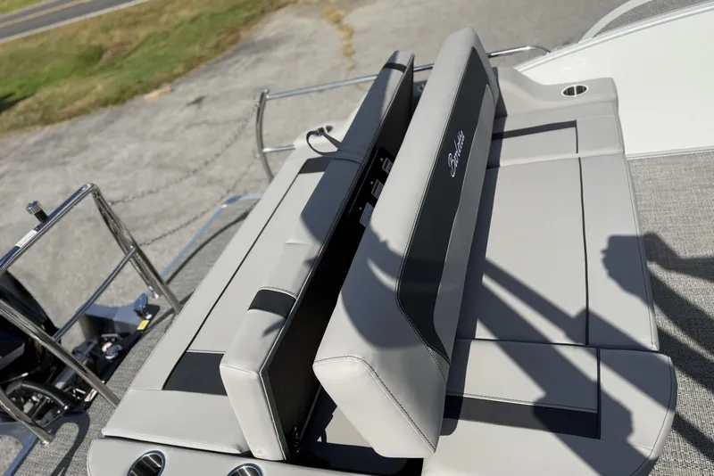 Slide: The Image of 2026 Barletta ARIA 22UC boat seating with sleek gray upholstery and cup holders. - 28