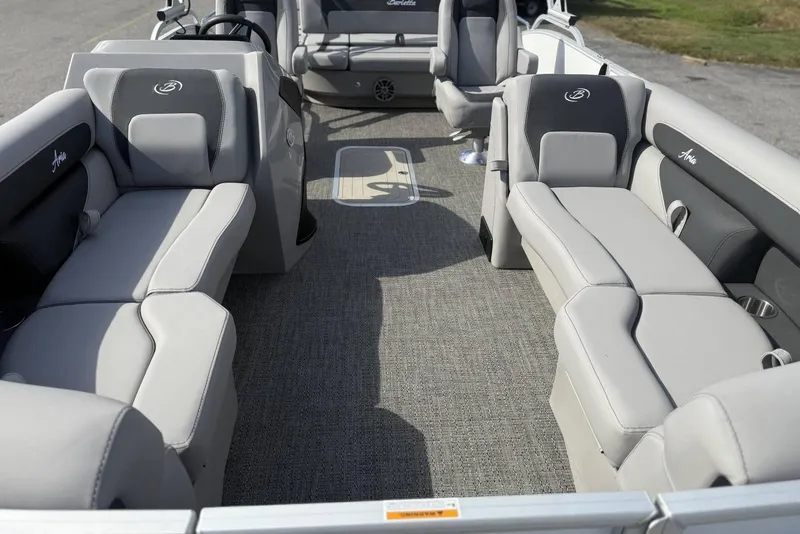 Slide: The Image of 2026 Barletta ARIA 22UC pontoon boat interior with plush seating and modern design. - 3