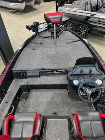 Slide: The Image of 2024 Phoenix Bass Boats 919 Elite interior with steering console and seating. - 3