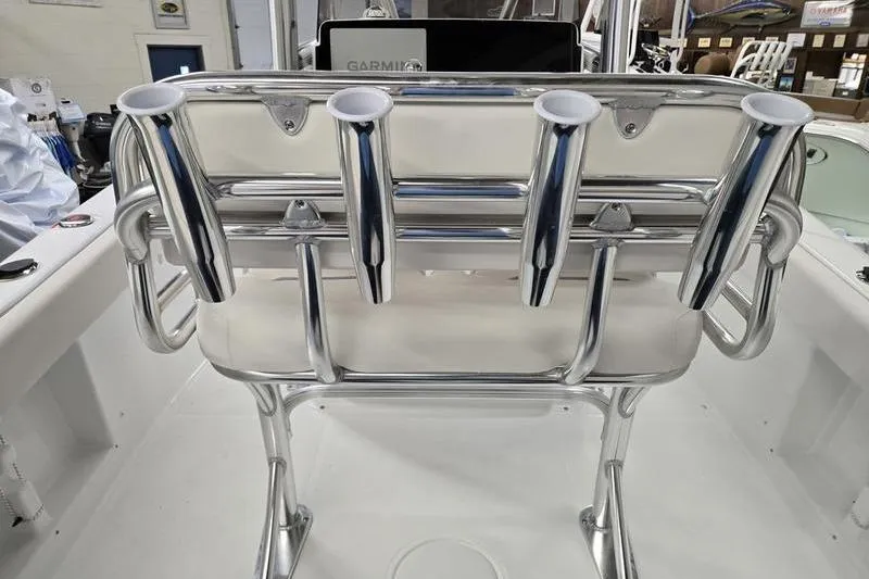 Slide: The Image of 2026 Sea Hunt Ultra 219 boat with stainless steel rod holders and Garmin equipment. - 20