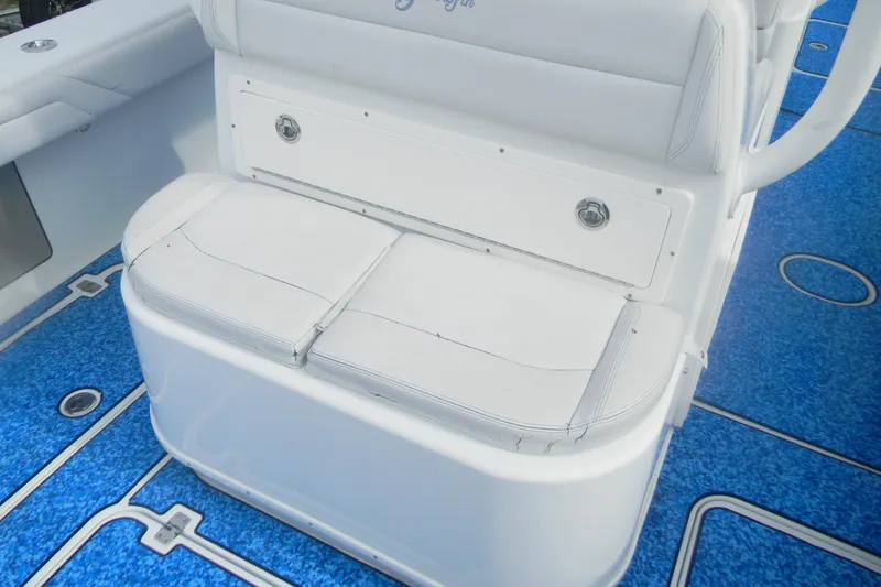 Slide: The Image of White seating on 2017 Yellowfin 32 Offshore boat with blue deck. - 9
