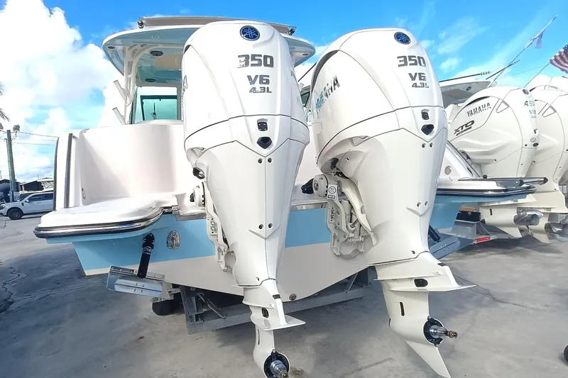 Slide: The Image of 2026 Grady-White Freedom 325 boat with twin Yamaha 350 V6 engines. - 11