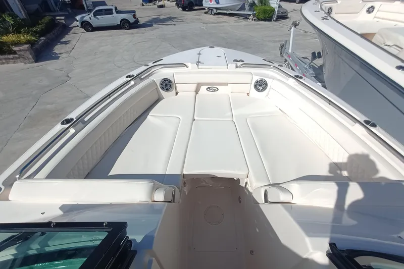 Slide: The Image of 2026 Grady-White Freedom 325 boat interior with spacious seating and modern design. - 28