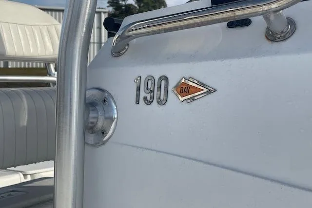 Slide: The Image of 2011 Triumph 190 Bay boat, close-up of logo and seating area. - 18